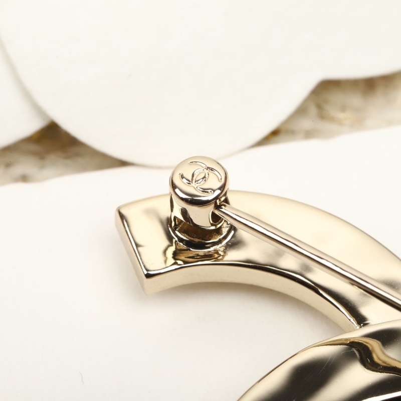 Ch**el brooches